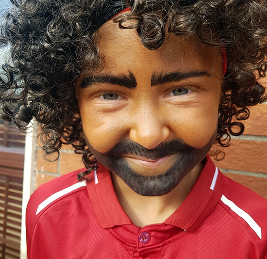 MERCURY PRESS. 29/10/18. Pictured: Nine-year-old Madison Mcguane dressed as Liverpool striker Mohamed Salah. A youngster who claims to be Liverpool FC player Mo Salah’s biggest fan has dressed up as her idol for Halloween. Despite the party having a spooky theme, nine-year-old Madison Mcguane, from Limerick, was adamant she wanted to dress up as the Egyptian forward. So the football fanatic, who has supported Liverpool her whole life, donned a full kit, curly black wig and special effects makeup to create the look. SEE MERCURY COPY